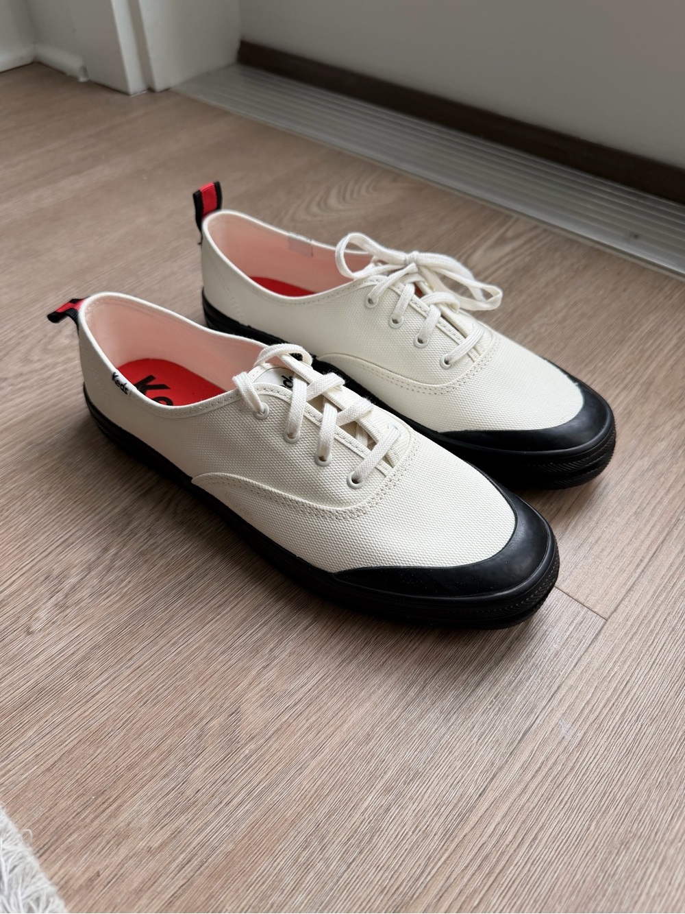 Keds Canvas Lace-Up Sneakers in Cream and Black
